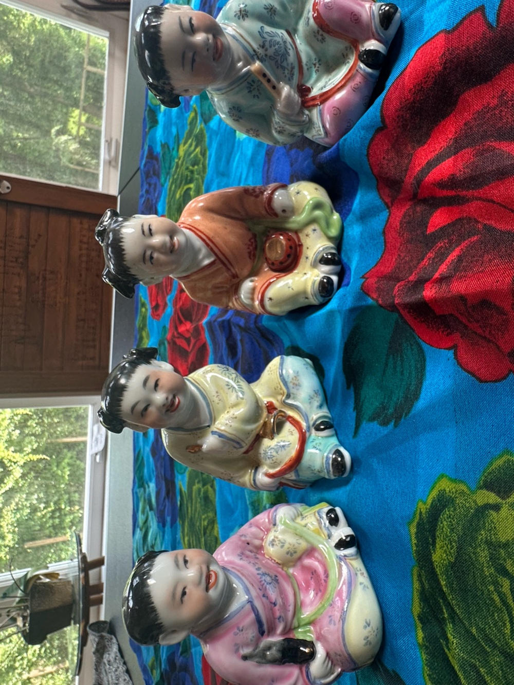 Set of Four Chinese Vintage Porcelain Sitting Child Figurines - Multicolor